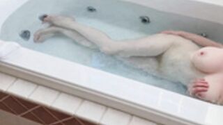Charlotte Doe steps into the bathtub