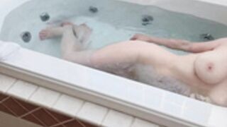 Charlotte Doe steps into the bathtub