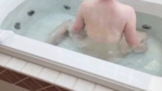 Charlotte Doe steps into the bathtub