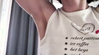 Fit cutie flexing biceps and armpits