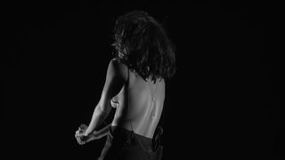 rihanna - goes topless