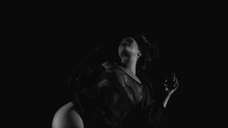rihanna - goes topless