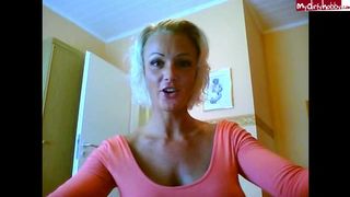 German camgirl Janina1911 showing huge silicone tits