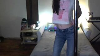 Cute girl tries on a couple outfits