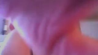 Gisele riding red toy