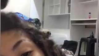 Two girls having fun on facebook live