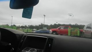Florida Blonde Amateur in Public Parkinglot about to Striptease Toned Legs