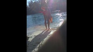 Blonde Sheds her Top in Public on River Beach as Butterfy Shed Cocoons