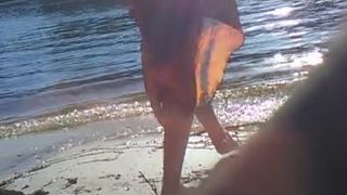 Blonde Sheds her Top in Public on River Beach as Butterfy Shed Cocoons
