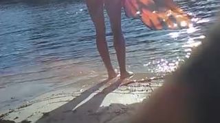 Blonde Sheds her Top in Public on River Beach as Butterfy Shed Cocoons