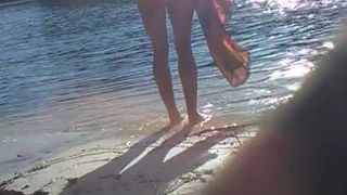 Blonde Sheds her Top in Public on River Beach as Butterfy Shed Cocoons