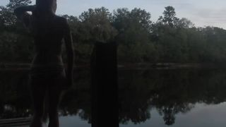 Risky Public Sunset Topless Striptease over Dock on River