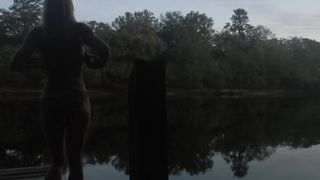 Risky Public Sunset Topless Striptease over Dock on River