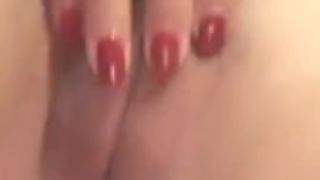 Chinese babe slaps her fat pussy