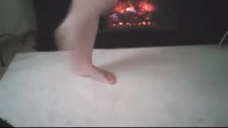 SEXY FEET BY THE FIREPLACE