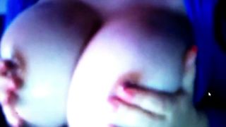Big oiled tities on cam