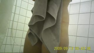 Dutch beauty takes a shower.