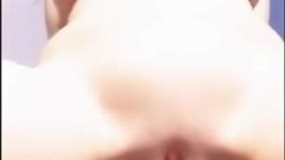 Amateur girl with big tits rides dildo