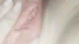 Fingering a pink pussy