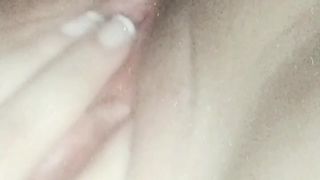 Fingering a pink pussy