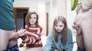 two sexy babes stroke hot cocks