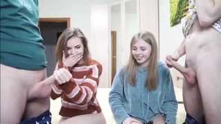 two sexy babes stroke hot cocks