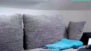 Girl masturbates on the couch