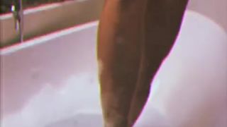 Nadine Kerastas dancing in the bathroom