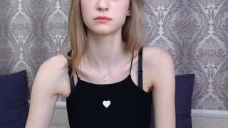 Barely legal Russian teen plays with her fine body