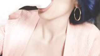 Lizbeth Eden sucks dildo