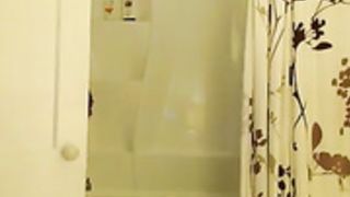 Kemply with her dildo after a shower