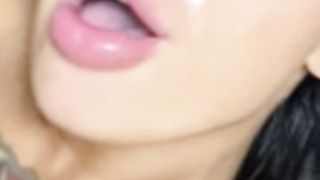 Joanna Bailess, fingers and milk,  in the mouth