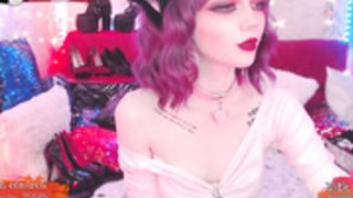 Violet haired seductress playing