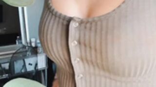 Liv stripping a top off