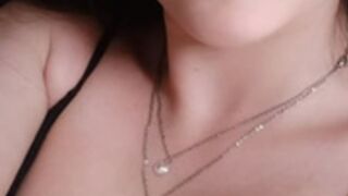 Busty latina brunette tanning by the beach