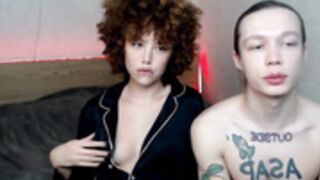 Devon and Jia on bed