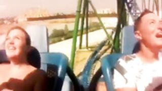Titties popping out during a roller coaster ride
