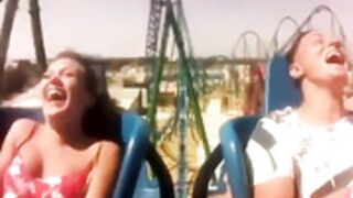 Titties popping out during a roller coaster ride
