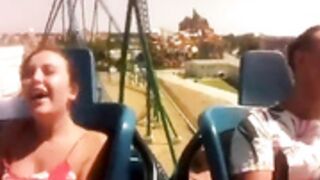 Titties popping out during a roller coaster ride