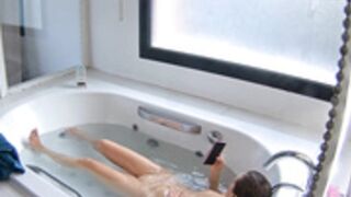 Holly make a bath and rub her pussy in the bathub