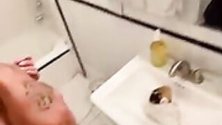 M1l@b@by plays in the bathroom