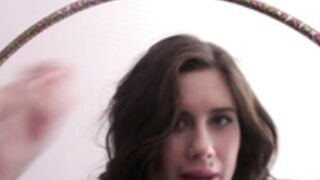 chloe lamb enjoying hula hoop