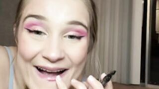 Big boobed Nat doing her lips