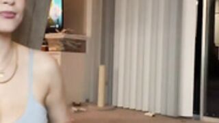 Big boobed Nat doing her lips