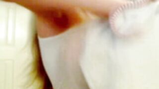 Young Gisele dancing in torn white T