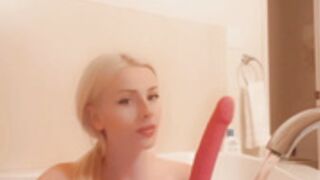 Msfiiire naked sucking on a large red dildo