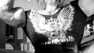 Monster muscle woman on garage