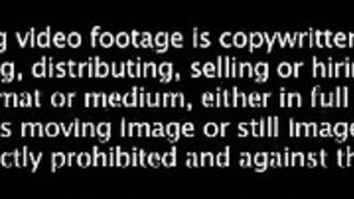 Gemma posing in latex leggings