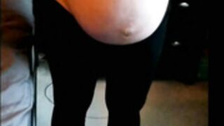 Pregnant with very huge nipples undressing