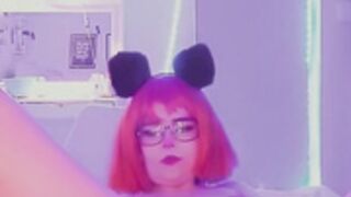 Girl in wig and glasses masturbates
